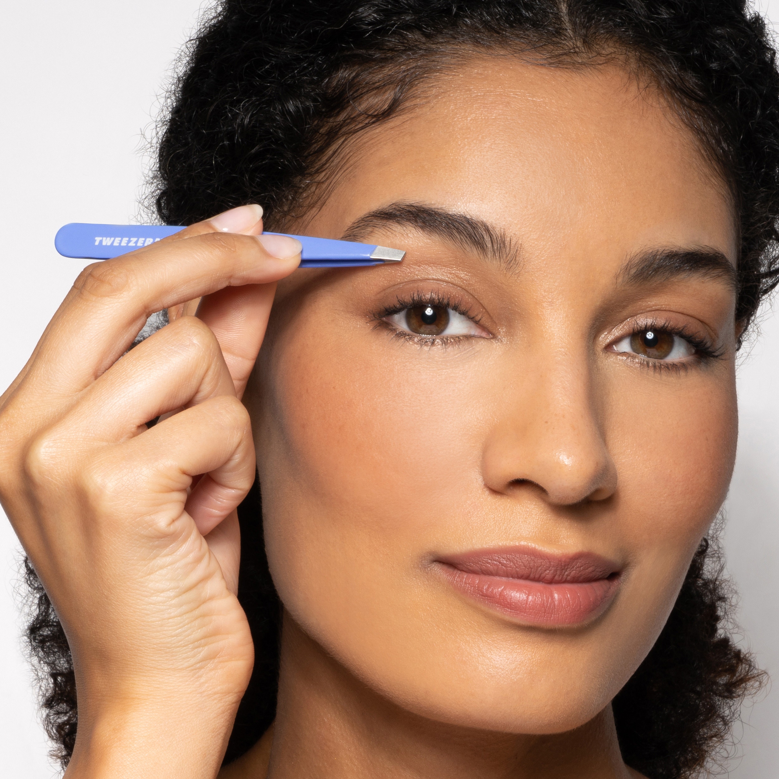 Model using Lapis Blue Slant Tweezer